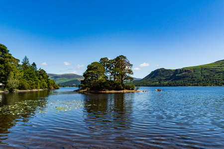 A view of Otterbield Bay on Derwentwater in the English Lake District on a summers morningの写真素材