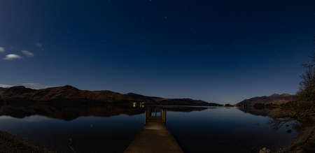 A Panoramic view of Derwentwater in the English Lake District on a moonlit night.の写真素材