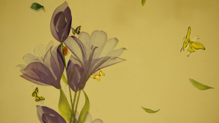 flowers and butterflies on a yellow background. close-up.の写真素材