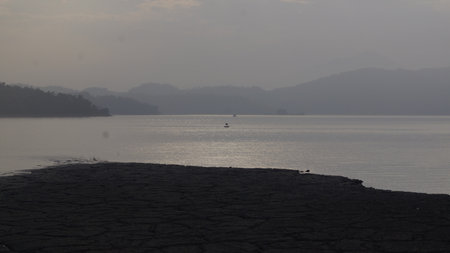Landscape view of the lake and mountains in the morning light.の写真素材