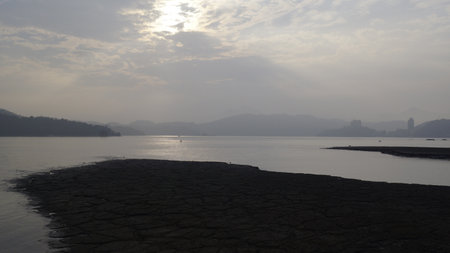 landscape view of the sea and mountain in the early morning.の写真素材