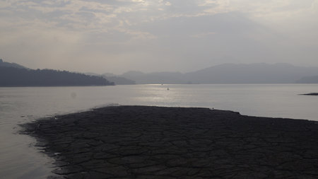Beautiful landscape of the lake and mountains in the early morning.の写真素材