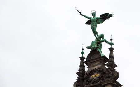 Michael Angel statue defeats the evil of the wordの写真素材