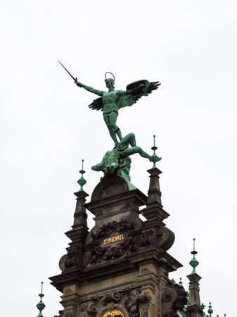 Michael Angel statue defeats the evil of the wordの写真素材