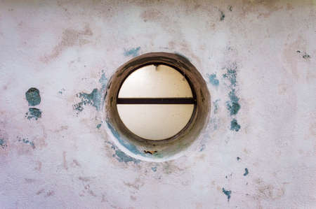 A round hole window of a cabinの写真素材