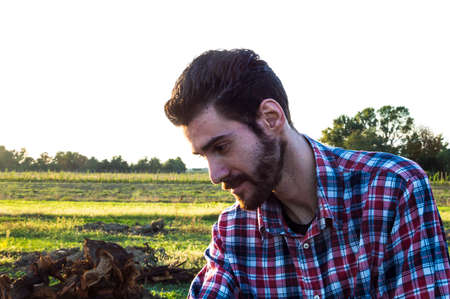 Focus on a farmer during his working dayの写真素材