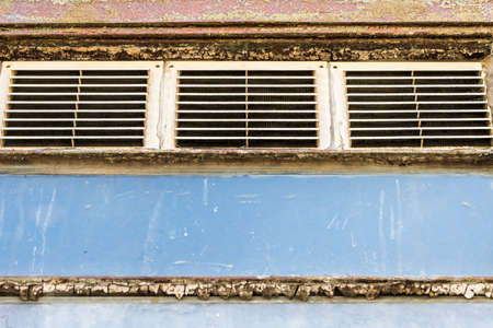 old metal vents with grating, factory North of Italyの写真素材
