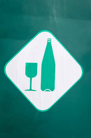 Green wine bottle with glass silhouette signboardの写真素材