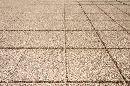 Detail of a brick stone floor, square designの写真素材
