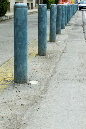 Traffic poles at the side of the street