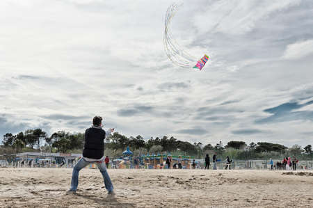 Man With His plays on the beach kitのeditorial素材