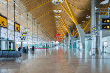 Madrid, Spain: 16th July 2016: The Madrid-Barajas Airport is Spain's largest and busiest airport, characterised by a floating roof propped by an internal coloured structure.のeditorial素材