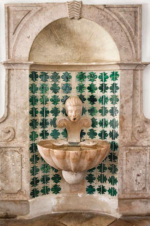 Ancient fountain with a picture of ceramic tiles in the Sintra - Portugalのeditorial素材