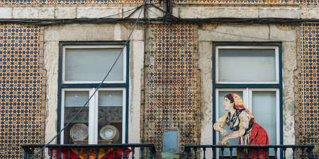 Lisbon, Portugal: 2016 July 19: detail of a street, housewife picture and dishesのeditorial素材