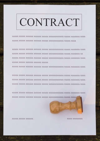 Stamp on a filled sheet of a contractの写真素材