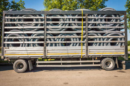 Industrial delivery with electric plastic pipes cargoの写真素材