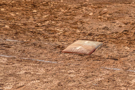 Detail of a home plate in a baseball (softball) dusty field, with copyspaceの写真素材