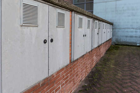 Cabinet counters meters installed in a wallの写真素材