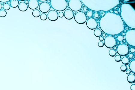 Bubbles in water close-up. Abstract blue background.の写真素材