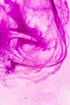 abstract background of colored ink in water close-up macro photographyの写真素材