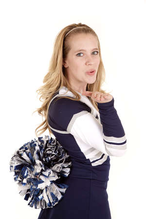 A cheerleader blowing a kiss to the cameraの写真素材