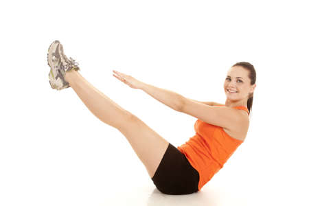 a woman exercising and doing some yoga strength trainingの写真素材