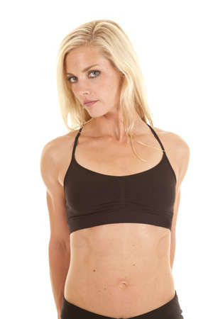 A woman looking forward while stretching out her arms and shouldersの写真素材