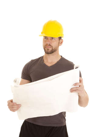A construction worker looking at the plans.の写真素材
