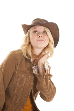 A woman showing off her attitude while wearing her western wear.の写真素材