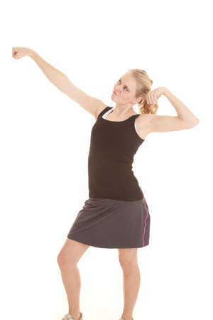 A woman showing some serious attitude in her workout clothes.の写真素材