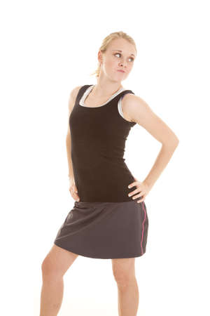 A woman showing off her attitude with her hand on her hip.の写真素材