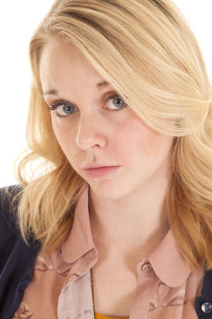 a woman with a serious expression on her face.の写真素材