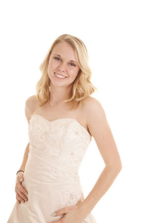 A woman with a smile on her face in her formal dress.の写真素材