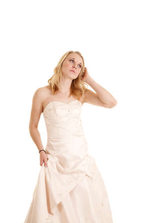 a woman in her formal dress with a peaceful expression on her face.の写真素材