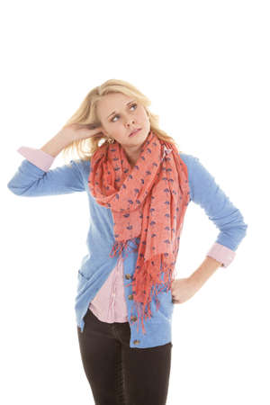A woman with a serious expression on her face she looks worried.の写真素材