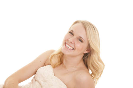 A woman in her formal dress with a smile on her lips.の写真素材