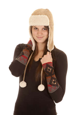 a woman in her winter clothes being warmの写真素材