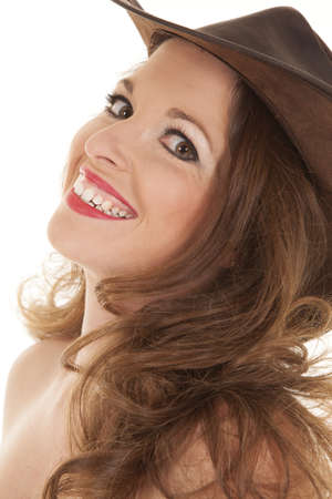 A close up shot of a woman with a hat and red lipstick on.の写真素材