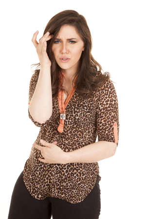 A woman showing that she is not feeling very good she feels sick.の写真素材
