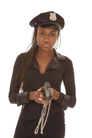 An African American woman cop with a gun.の写真素材