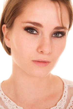 A close up of a woman looking at the camera.の写真素材