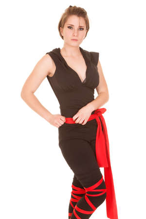 A woman ninja with a serious expression on her face.の写真素材