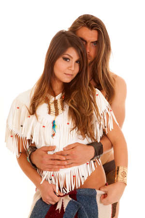 An American man holding on to his Native American woman.の写真素材
