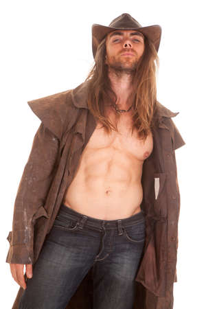 a cowboy in his duster and hat with no shirt on.の写真素材