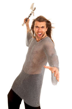 A man in medieval chain mail getting ready to battle with his axe.の写真素材