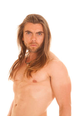 A man with no shirt on showing off his fit body.の写真素材