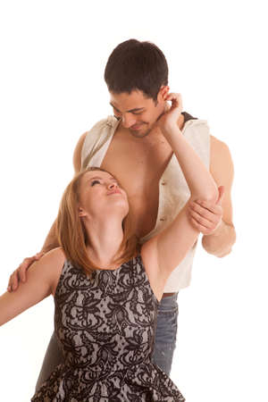 A woman is looking up at a man who is looking down at her.の写真素材