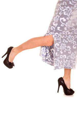 Legs of a woman running away to the side.の写真素材