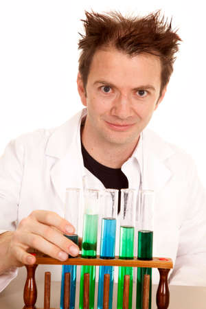 A mad scientist is ready to pick up a test tube.の写真素材