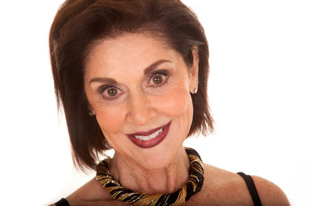 a close up of an older woman with a smile on her face.の写真素材